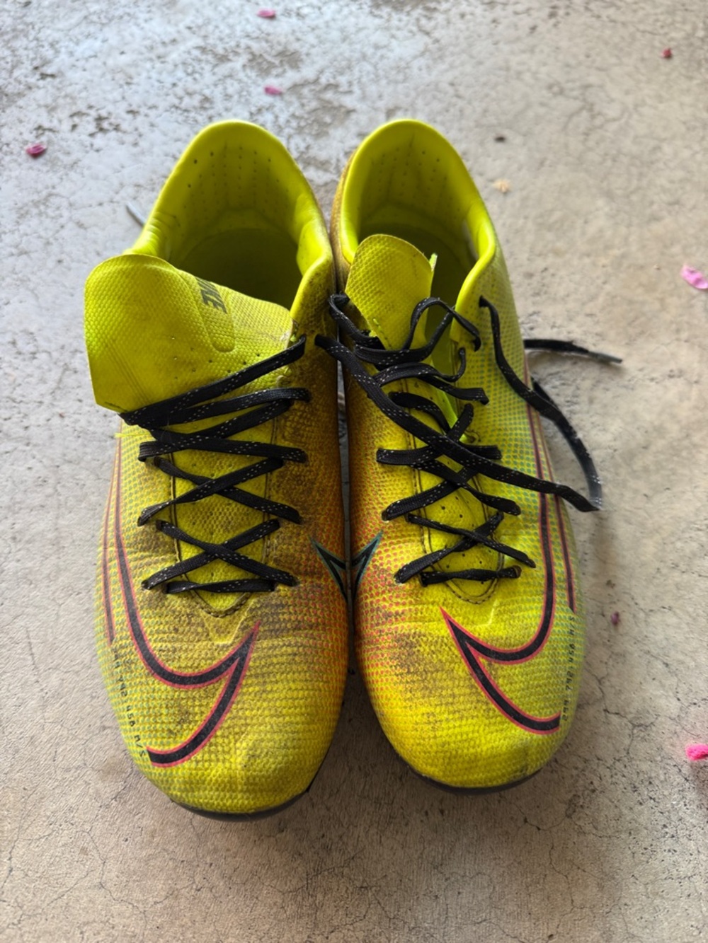 Nike Yellow Soccer Cleats with Black Laces and Pink-Outlined Swoosh